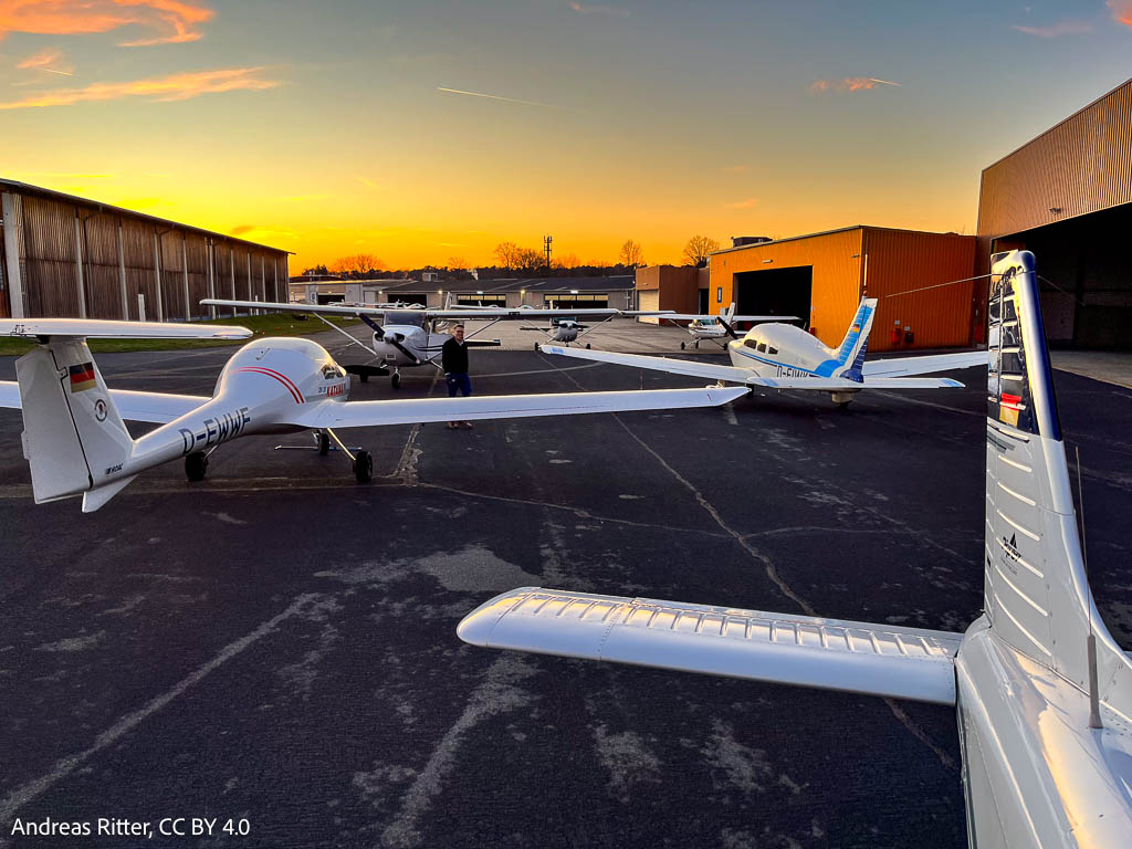 small aircraft at sunset